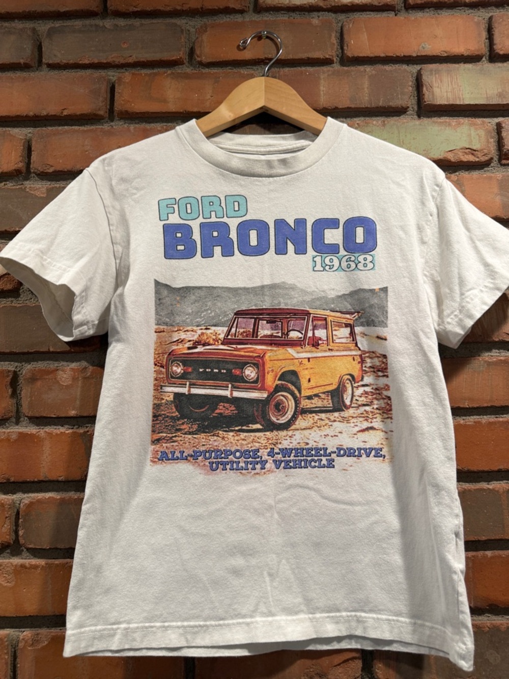 Abercrombie & Fitch soft off white Tee with Yellow Bronco Graphic